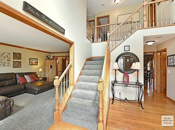 This 2 story foyer is a great place to welcome all of your guests.