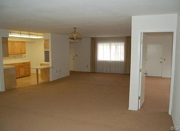 View from family room looking into formal dining room and living