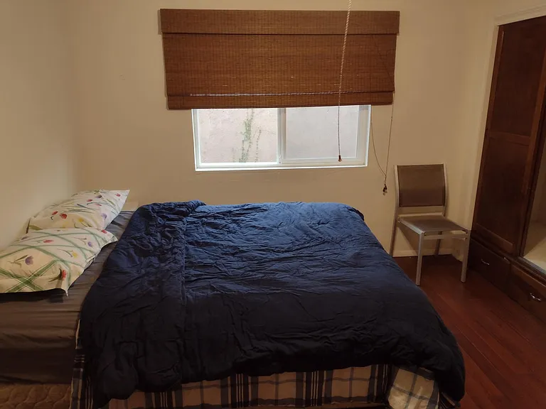 Bedroom #2 bed and window