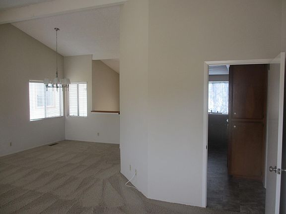 Dining area with kitchen to right