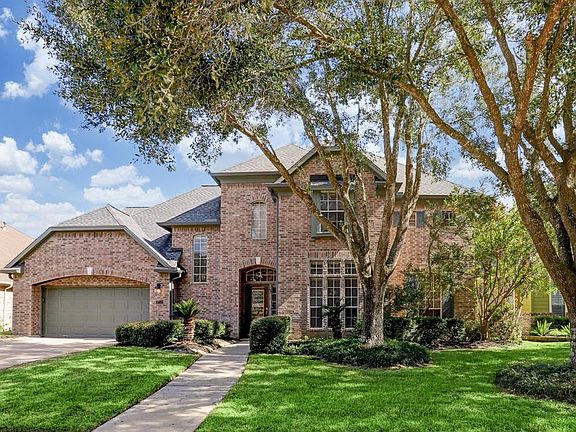 Beautiful Cinco Ranch home features everything you could EVER want! 3 car garage, 2 bedrooms down, 3 bedrooms up with a game room and a media room. Large chef's kitchen, with tons of cabinets and counter space. Do not miss this amazing opportunity!
