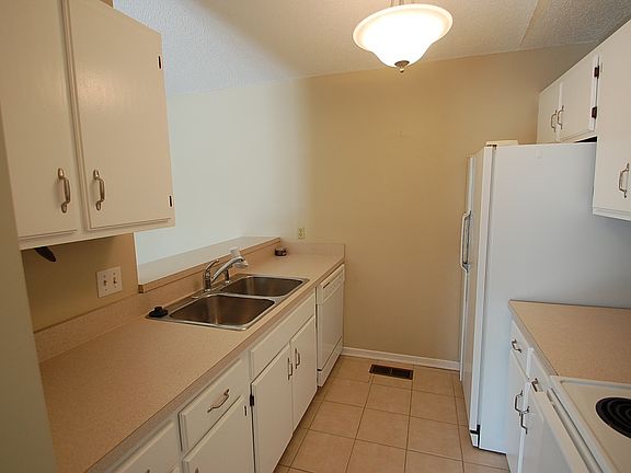 Tile floor and newly painted cupboards