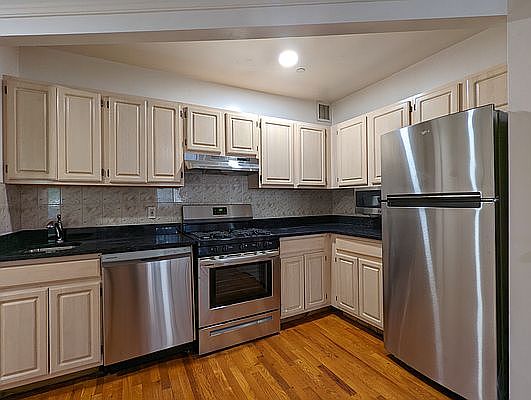2nd image of 394 E 8th St APT 1F