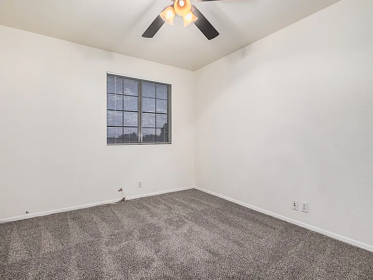 6636 N 90th Dr — Photo 12