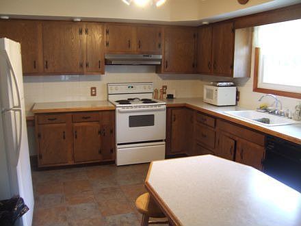 Large Kitchen with tile flooring