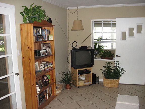 Living room large tile through out most of the house. Bamboo floors in 2 rooms