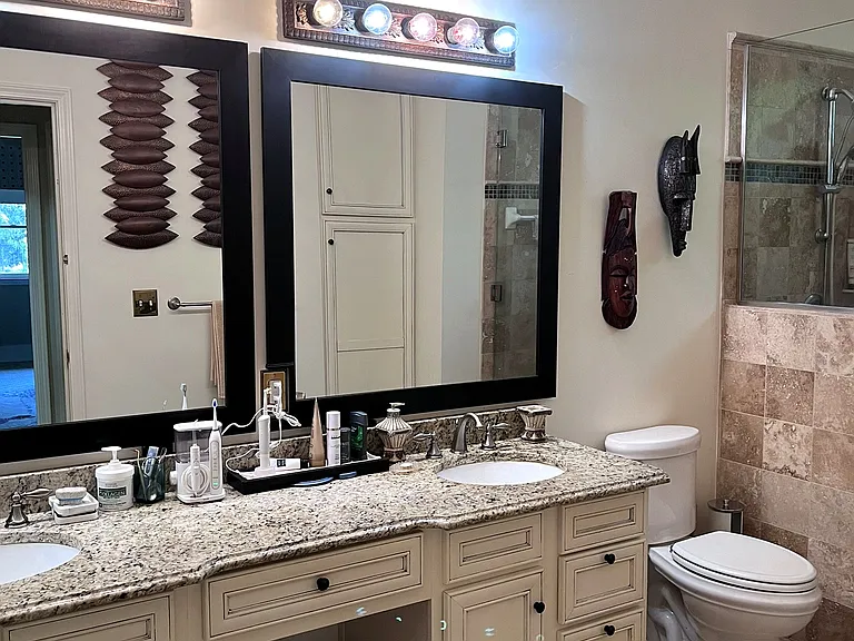Master bathroom with 5' shower and a double vanity.