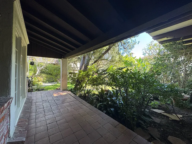 Covered porch - shaded brick porch overlooking the garden.