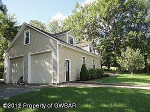 Detached 4 car garage w/ loft