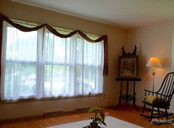 Large Triple Window in Living Room