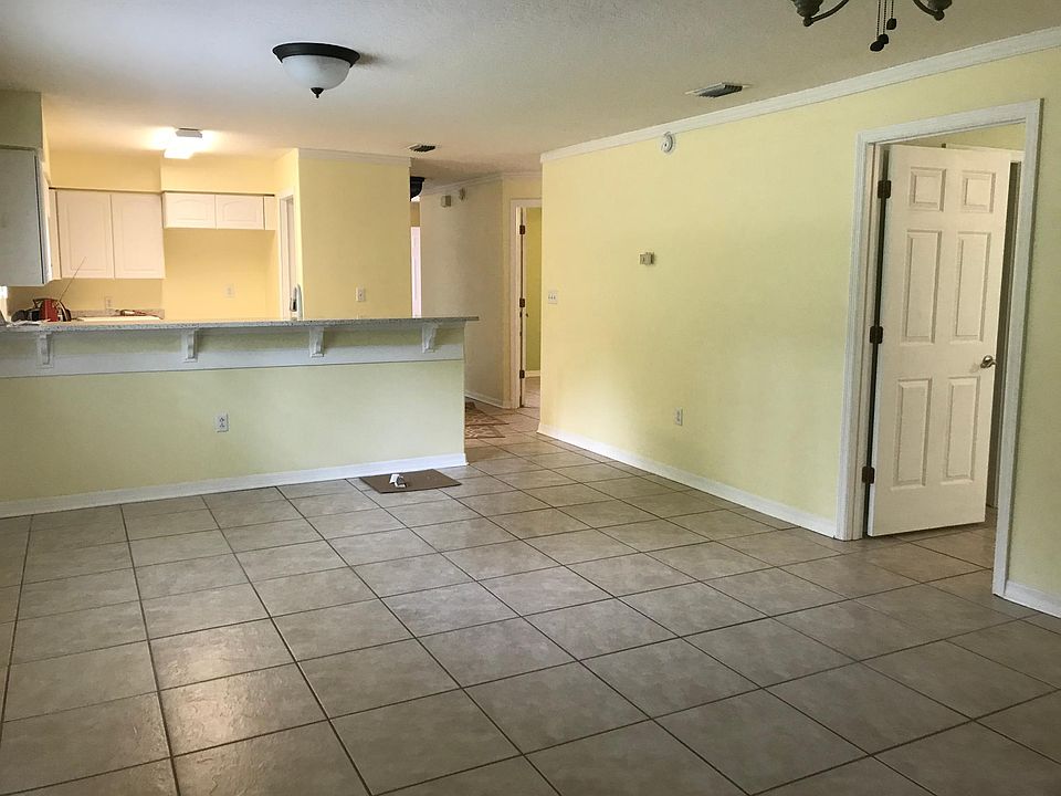 Fresh paint in all rooms, no carpet, all tile floors have been professionally steam cleaned