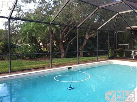 Large pool with amazing views of park like back yard