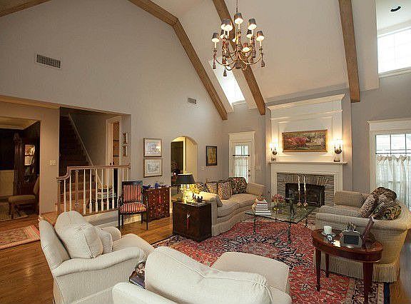 Soaring ceiling with second story windows