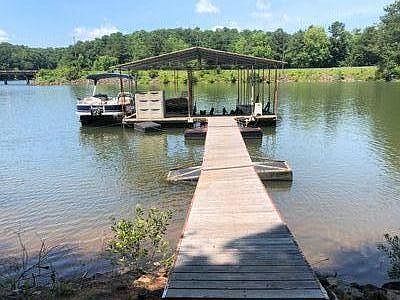 Private 720ft Covered Dock with Electricity, Water, lighted Pathway and the lake.