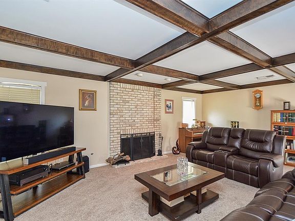 Look at the size of this room. Perfect place for all the holiday gatherings. Although this is a "formal" living area, the room is warm and inviting and relaxing.