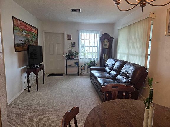 4th image of 1060 W 26th Court
