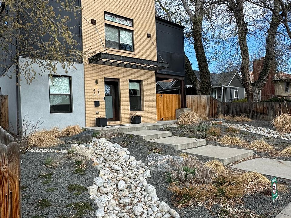 Front of home with xeriscape custom landscaping