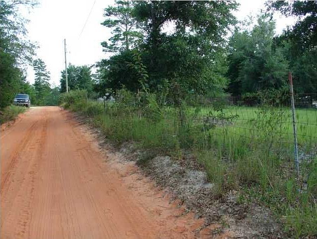 1.28 ACRES - 200 ft of road frontage