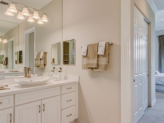 Dual vanities in owner s bath