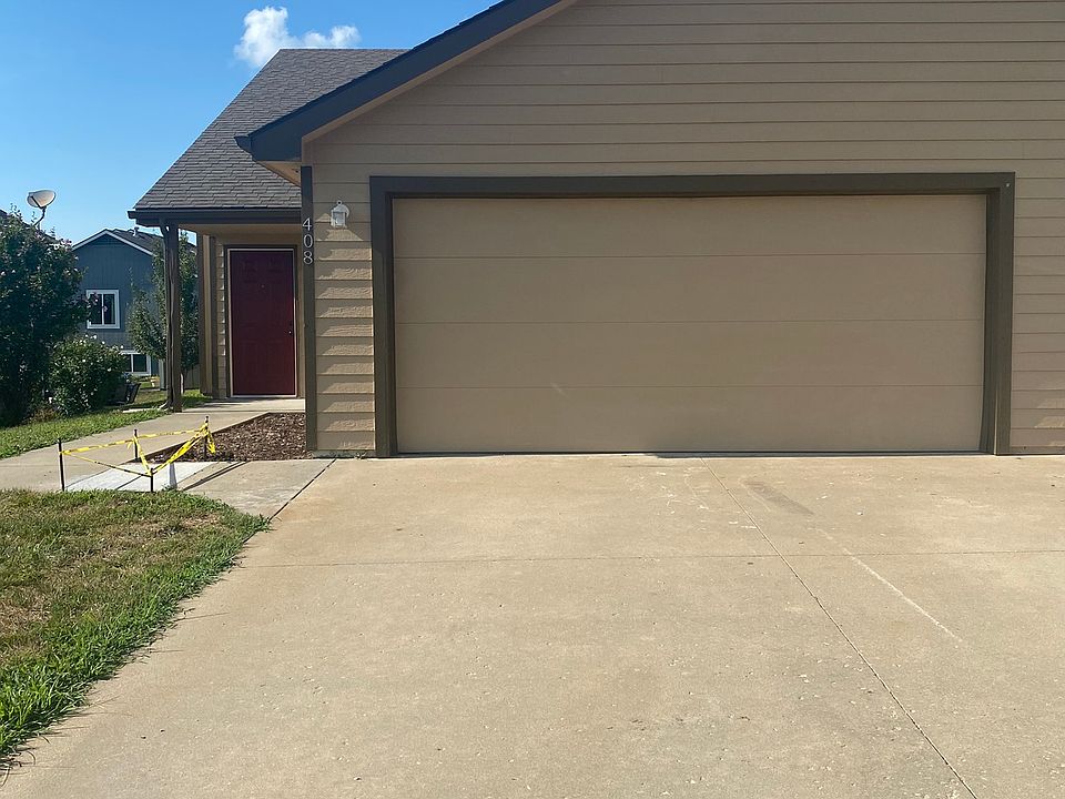 Front door and 2 car garage