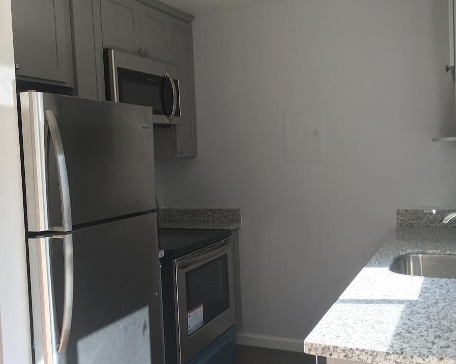 Brand new kitchen with stainless steel appliances