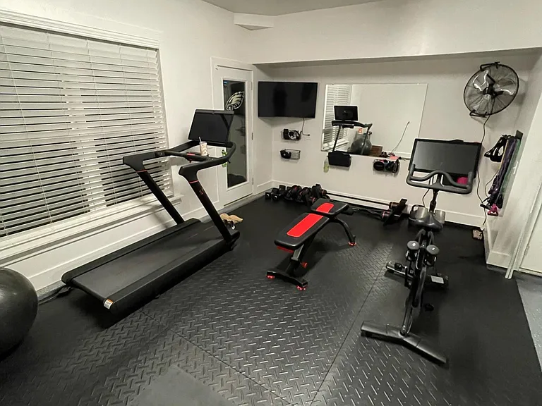 Back view of 2 Car Tandem Garage (gym mats available for purchase)