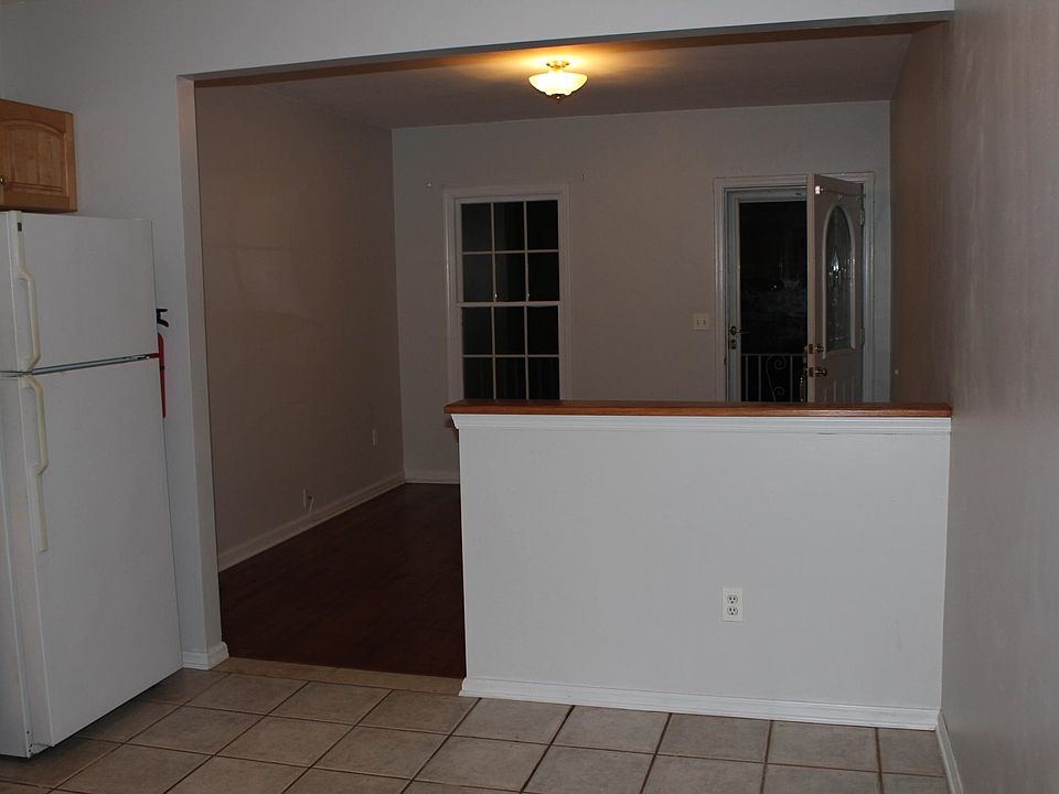 living room next to kitchen