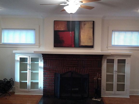 beautiful working fireplace with half cord firewood supply