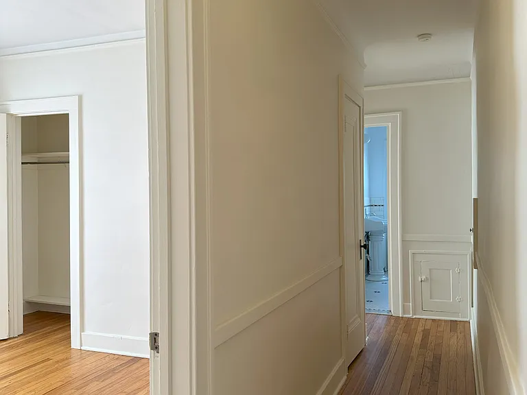 Bedroom #1, hallway to bedroom #2 and bathroom. Linen closet.