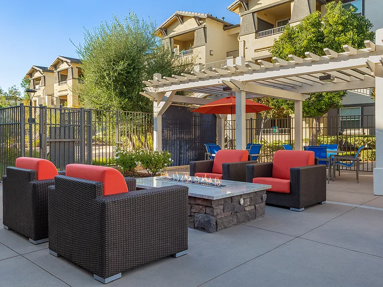 Enjoy cozy evenings outdoors in beautifully maintained common areas that elevate your living experience