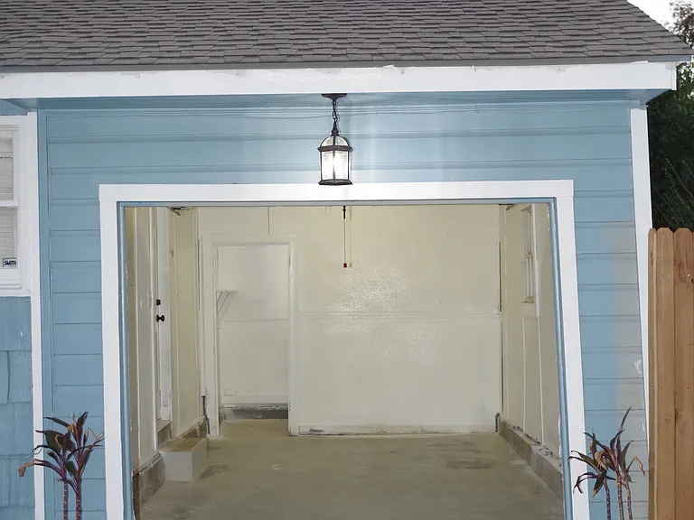 Garage interior with storage room at the rear