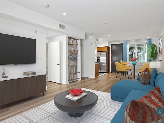 Living Room, Dining, and Kitchen with Vinyl Flooring, and Recessed Lighting