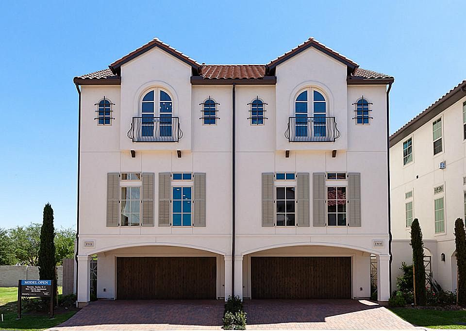 Artfully designed townhomes define the Enclave at Lake Pointe offering unique personal statements of