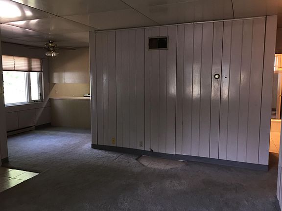 living room wall, dining room on left bathroom on right