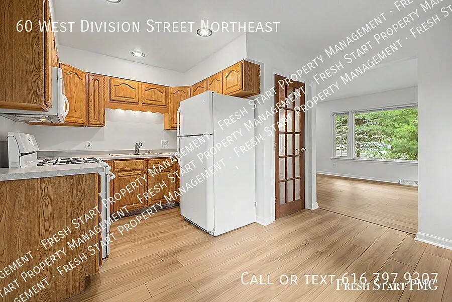 Charming 2-Bedroom Retreat in Rockford Cozy Living at 60 West Division Street! — Photo 3