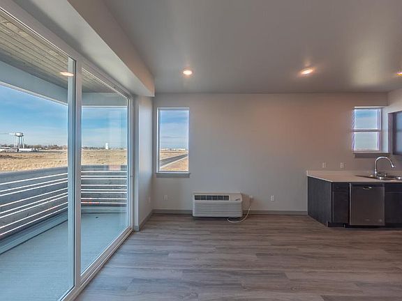 Living Room Area, showing view out to the north and side windows.