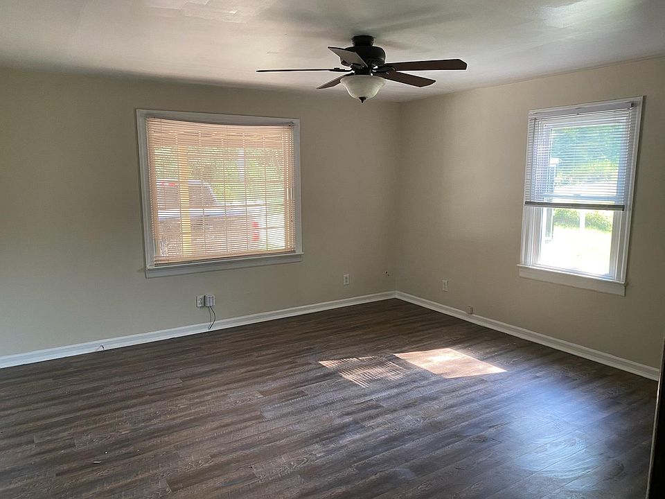 nice size living room with lots of natural sunlight