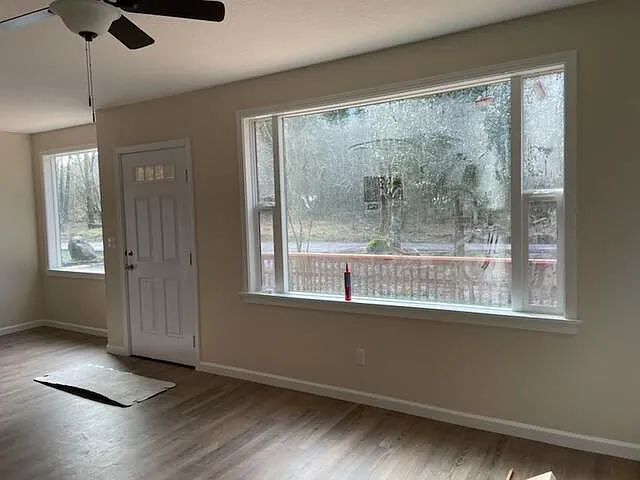 The outlook to the front deck and wooded area.