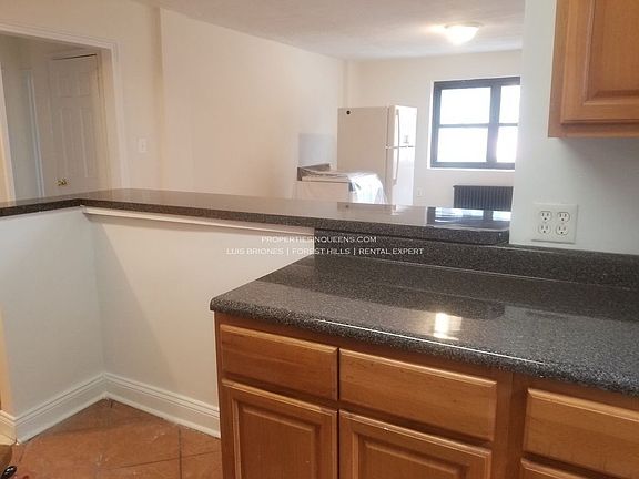 2nd image of 6209 Woodhaven Blvd APT 2A