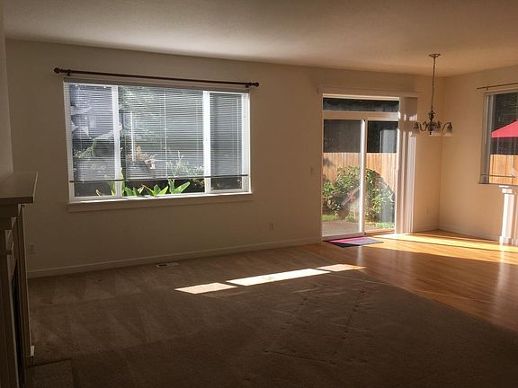 Open floor plan; glass doors lead to the back yard