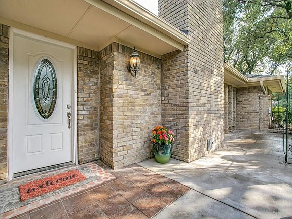 Renovated gated patio is a serene first impression for your guests, and offers an additional outdoor seating area!