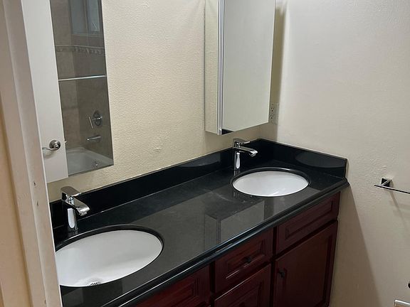 Double sinks at the hallway bathroom
