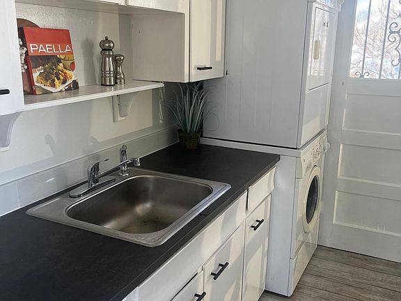 Updated kitchen has plenty of cabinet space.