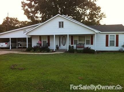 View from highway
						:
						Front view of home