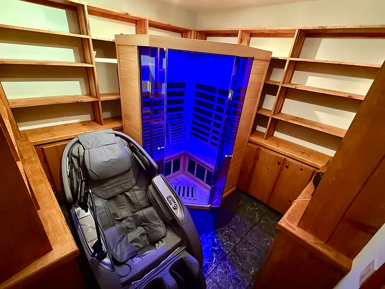 After hitting the slopes, step directly into your adjacent private meditation sanctuary to unwind with a premium infrared sauna, executive massage chair, and integrated music setup.
