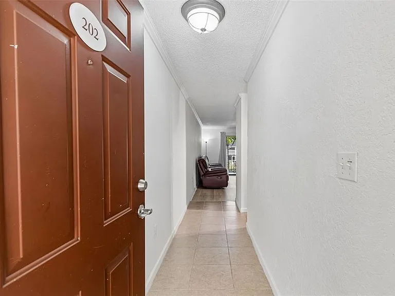10100 Sailwinds Blvd N #202 — Photo 15