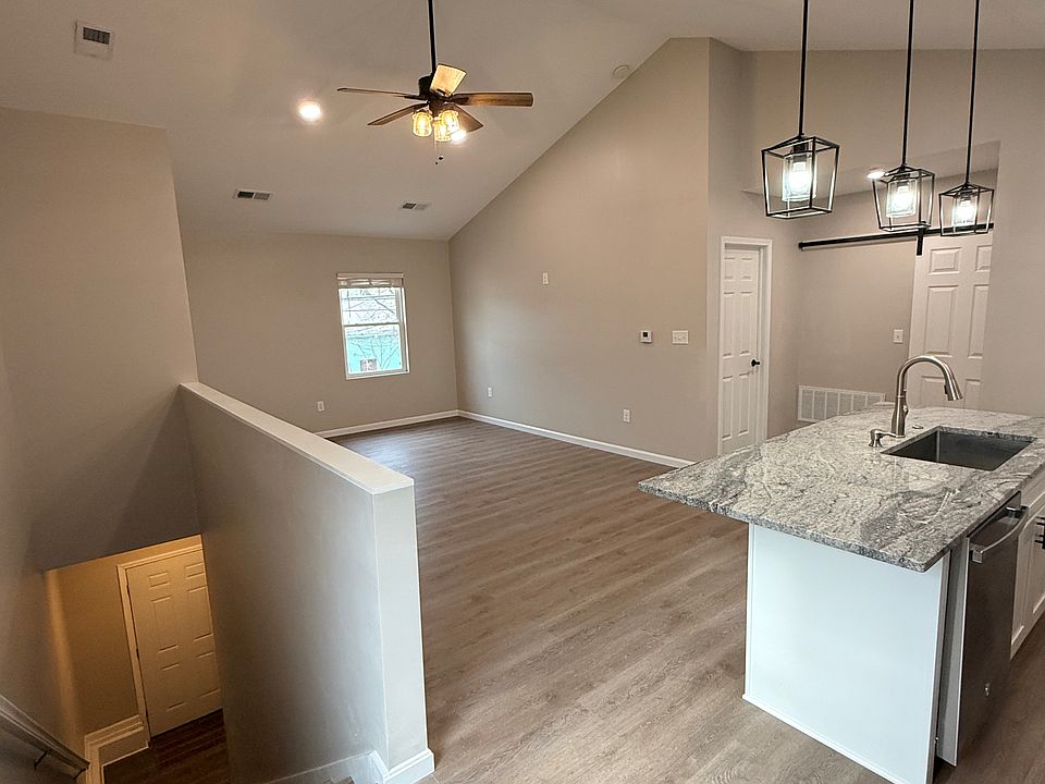 Spacious great room with soaring cathedral ceilings.