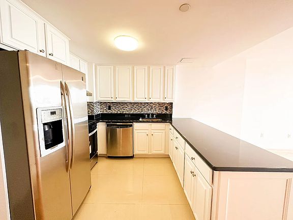 2nd image of 13338 Sanford Ave #16E