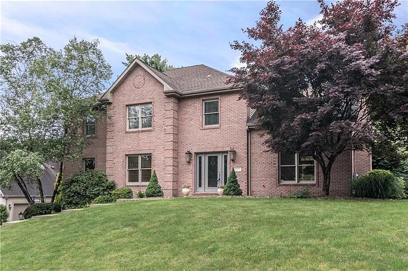 Custom-built brick home in the "desirable" private neighborhood of Settlers Grove.