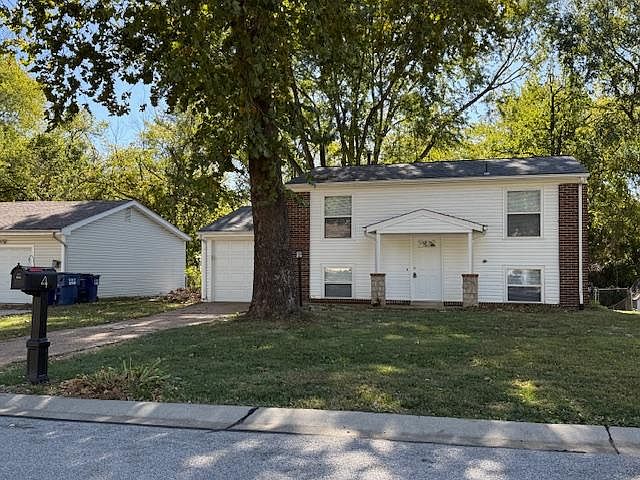 4 bedroom 1.5 bath split level home with one car garage with easy access to Hwy 364, Midrivers Mall Dr. & shopping